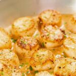 Here’s a delicious recipe for Pan-Seared Lemon Butter Scallops: