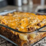 This hearty casserole is a comforting and satisfying meal that combines the flavors of juicy ground beef, creamy potatoes, and melted cheddar cheese. It’s perfect for a family dinner or a potluck.